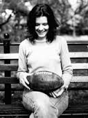 Edie Brickell Holding a Football